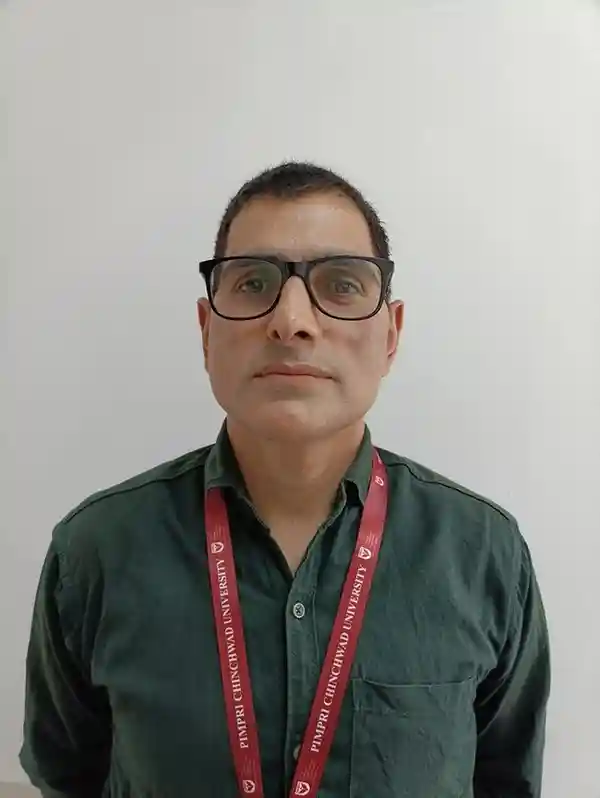 Dr. Nazir Ahengar